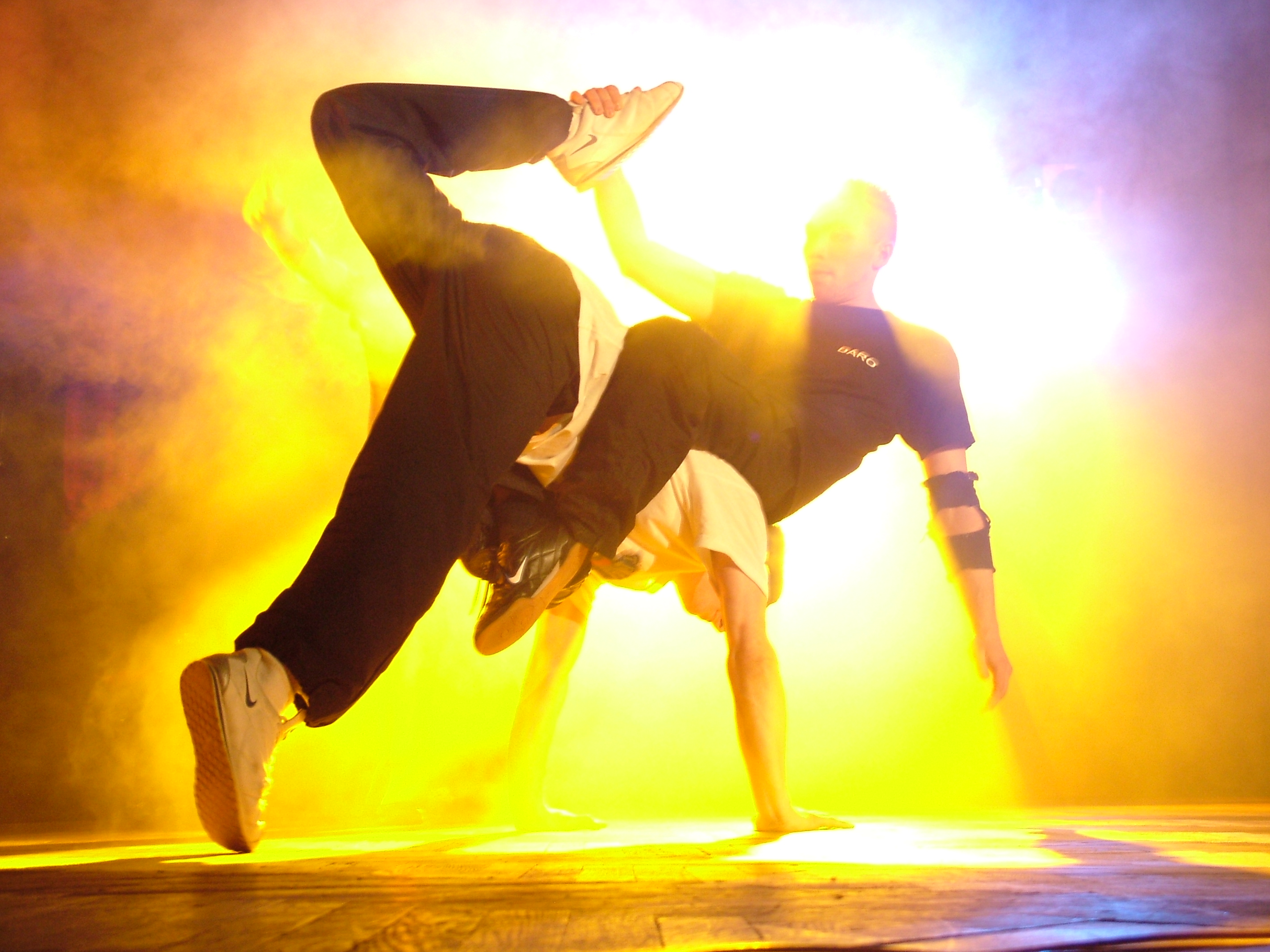 People Dancing very fast on a stage