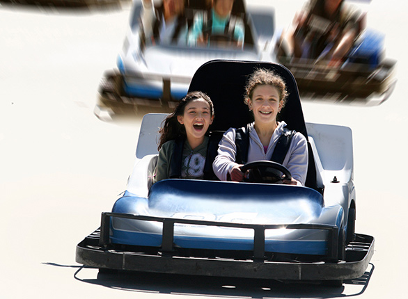 People Riding in a Go Kart